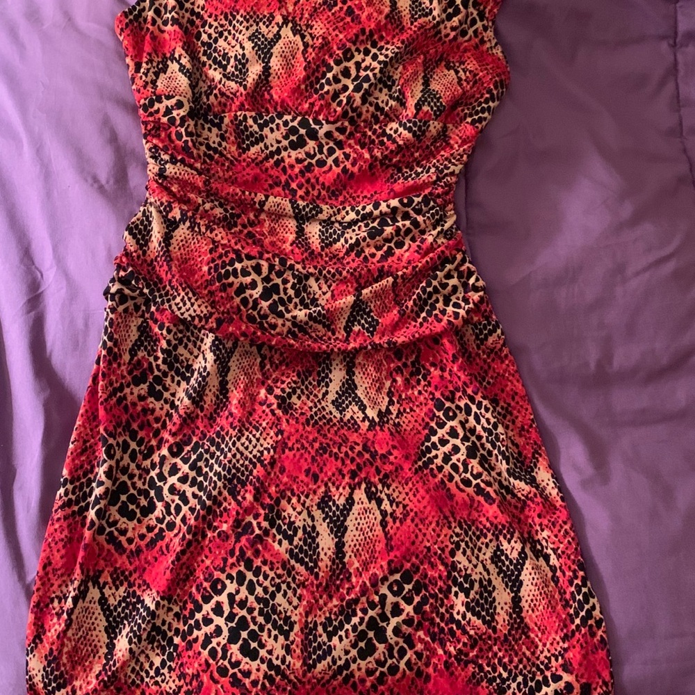 Knee length dress.